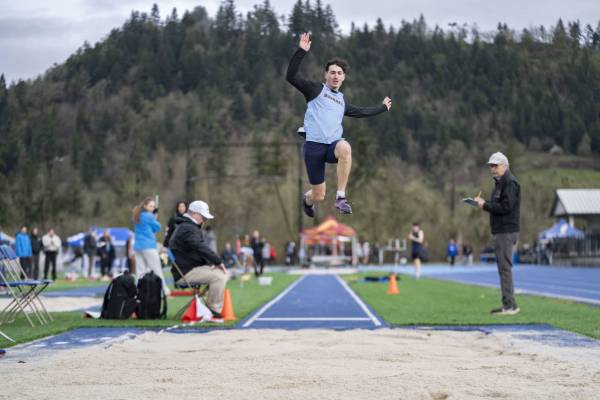 A group of basketball players and fans celebrating A group of basketball players and fans celebrating