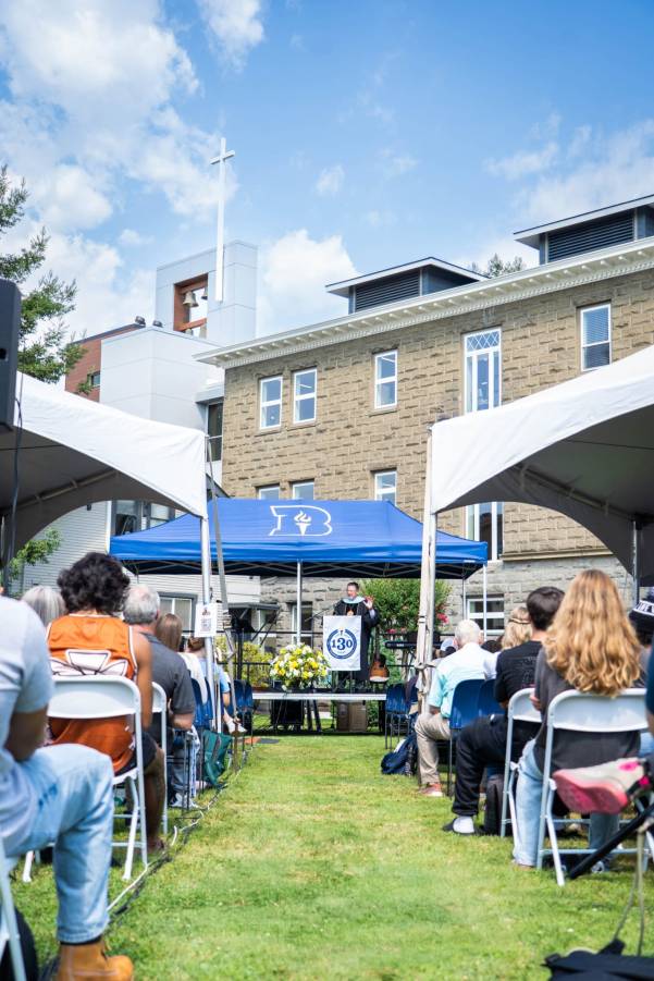 Two men walking on a road Two men walking on a road
