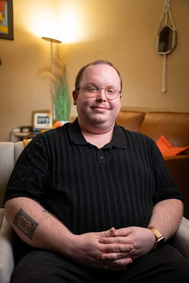Person sitting in chair in office Person sitting in chair in office
