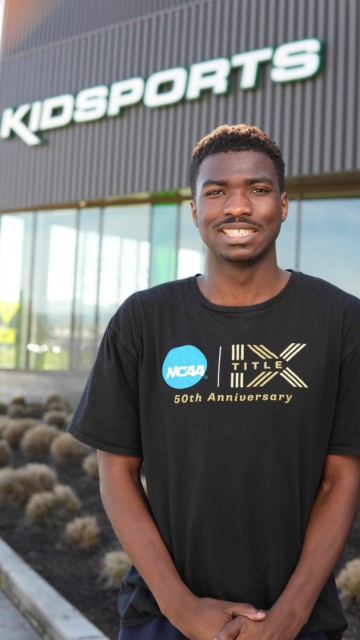 What began as an opportunity to gain coaching experience became a meaningful step toward a future of helping others for Jah’lin Green ’26.

After completing his spring internship with @kidsports4life, the interdisciplinary studies graduate reflected on how the experience strengthened both his confidence and passion for mentoring young athletes. Serving as an assistant coach, Jah’lin worked closely with children from throughout the Eugene community, developing personal skills in communication, patience, and leadership while helping create an encouraging environment for every participant.

Living with autism himself, Jah’lin felt a connection to children who face similar challenges, and he hopes to become a coach who helps young people feel supported and accepted. His experience with Kidsports also gave him a clearer picture of his future goals. Inspired by his time mentoring, he hopes to one day create a specialized track and field program that encourages children who may feel overlooked or underestimated to participate in athletics and build confidence in themselves.

Jah’lin expressed gratitude for the people who encouraged him along the way, especially Coach Walcott, who helped connect him with the internship opportunity. Reflecting on the experience, Jah’lin encourages other students to believe in themselves and embrace opportunities for growth. “Be proud of yourself,” he advised. “Just be happy of what job you’re going to get in the future.”

Great work, Jah’lin! 👏
Read the full article at Bushnell.edu
Watch the full video on our Bushnell University YouTube!