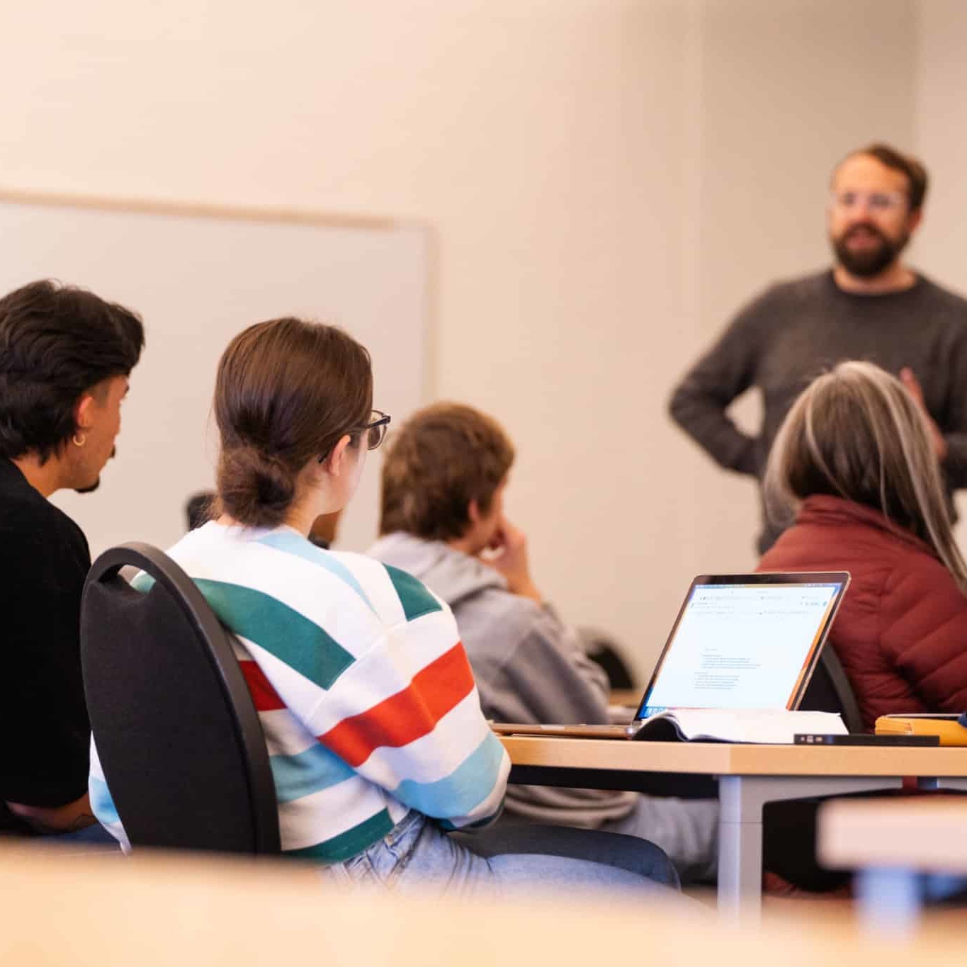 students in classroom on computer