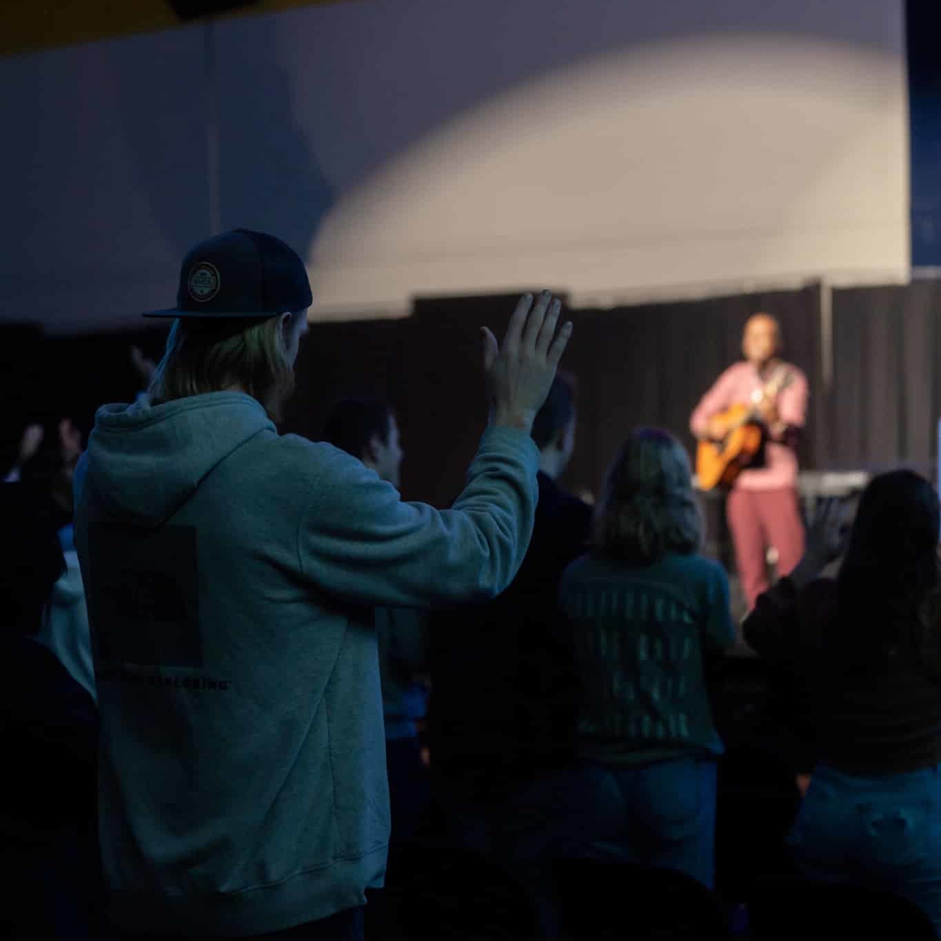 person singing in chapel