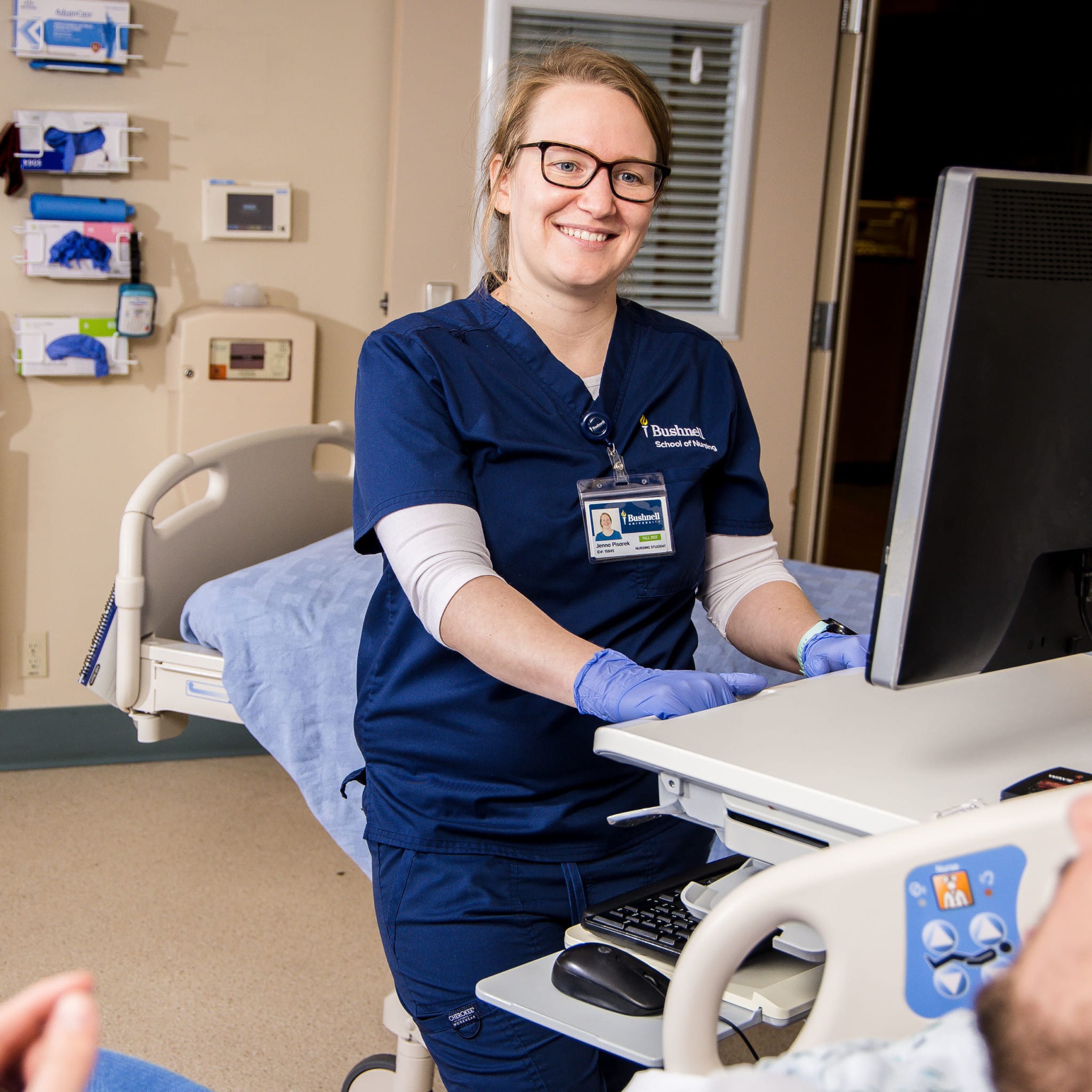 Nursing Student Records Symptoms on Computer