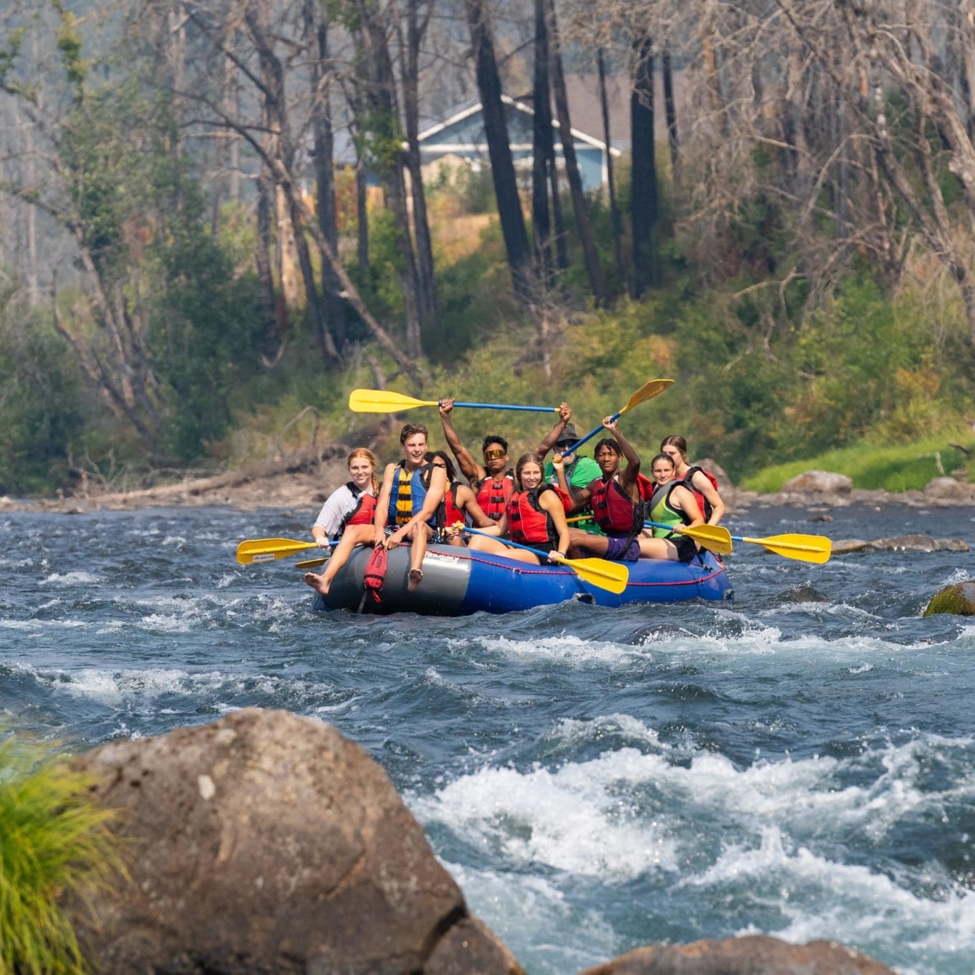 people whitewater rafting