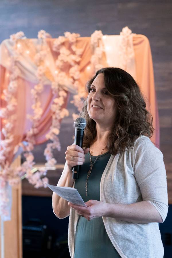 Person talking into a mic