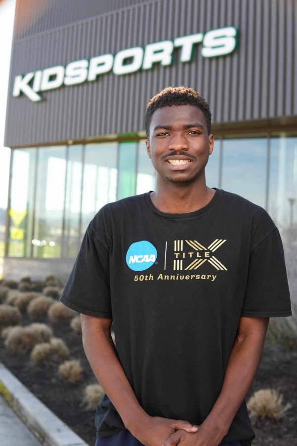 Portrait of college student in front of Kidsports community sports complex